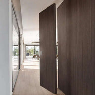 modern wooden door with flush pivot hinge stainless steel for smooth 360 degree movement in contemporary interior