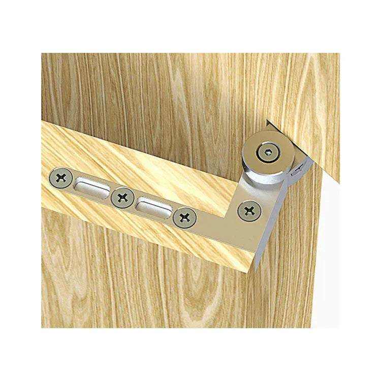 Stainless steel one-way door pivot hinge installed on wooden door corner showing adjustable height and hidden design for secret doors and bookshelves